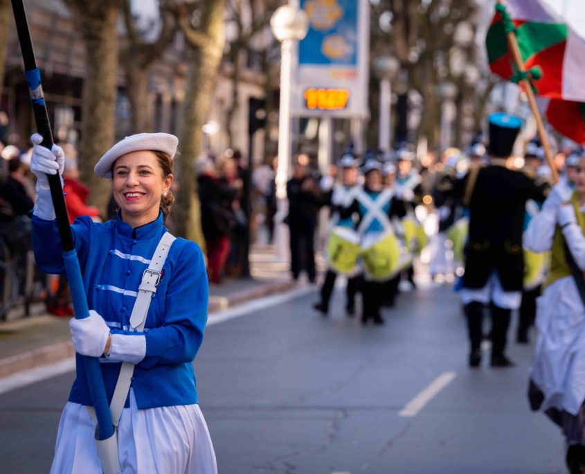 DONOSTIA, SPAIN - JANUARY 20: Undefined woman in traditional dress participate in Tamborrada parade on January 20, 2020 in Donostia-San Sebastian, Spain